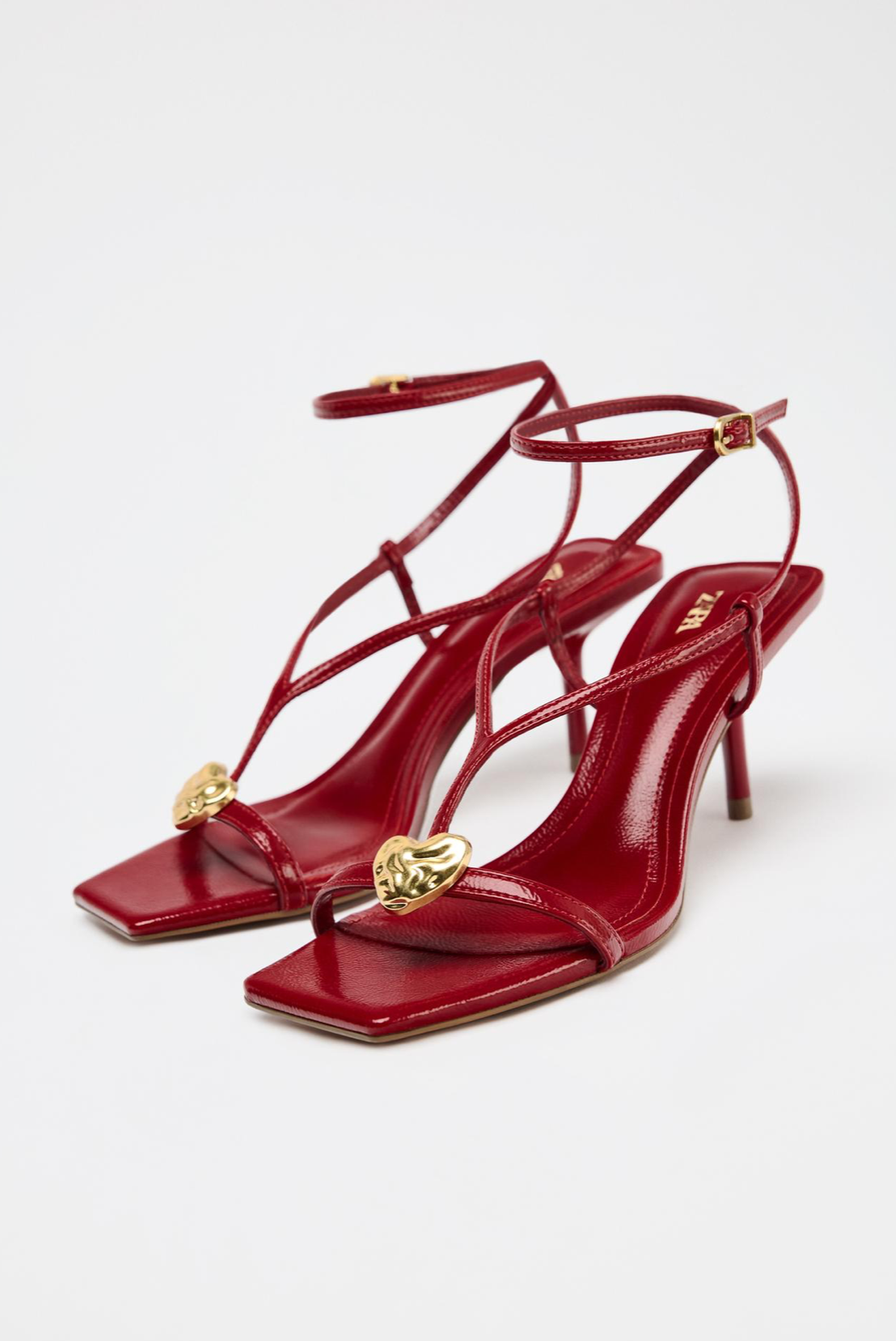 HEELED SANDALS WITH METAL DETAIL